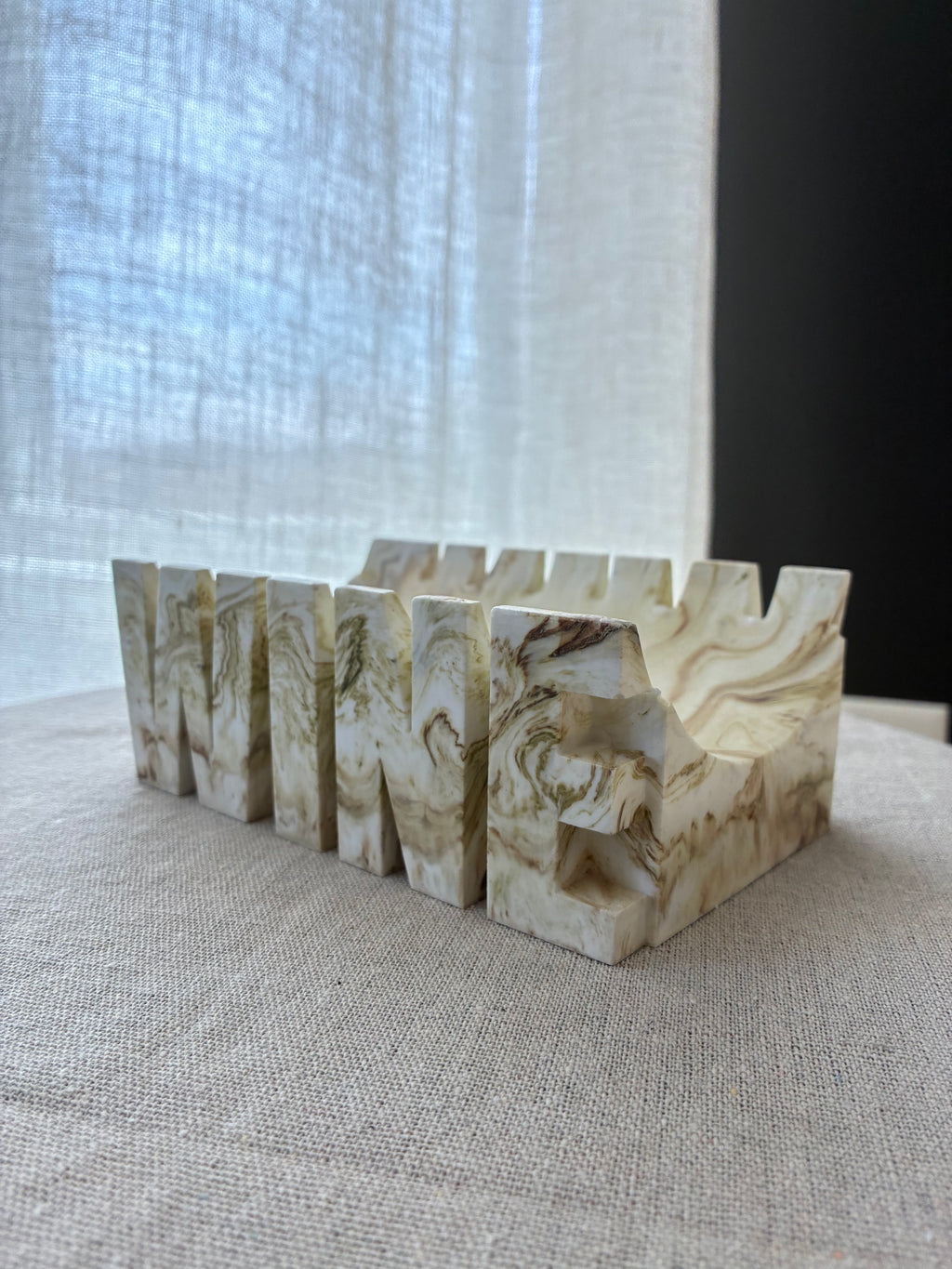 Ivory Strata – Sculpted Wine Cradle