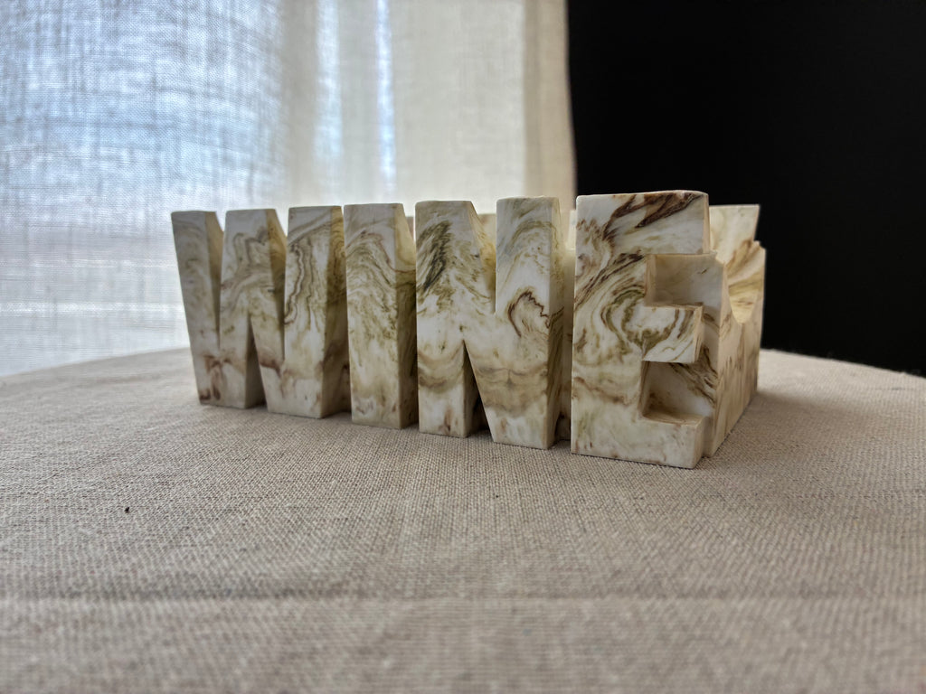 Ivory Strata – Sculpted Wine Cradle