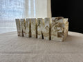 Ivory Strata – Sculpted Wine Cradle