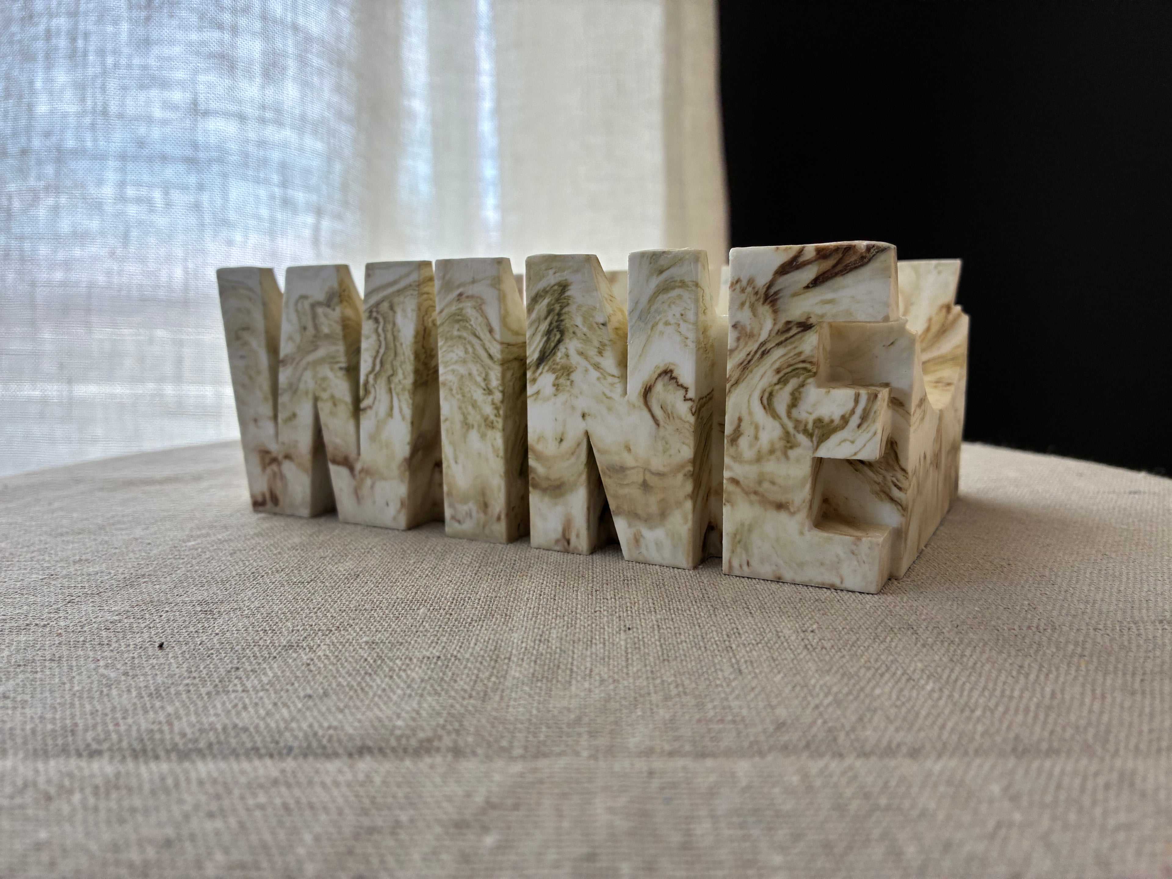 Ivory Strata – Sculpted Wine Cradle
