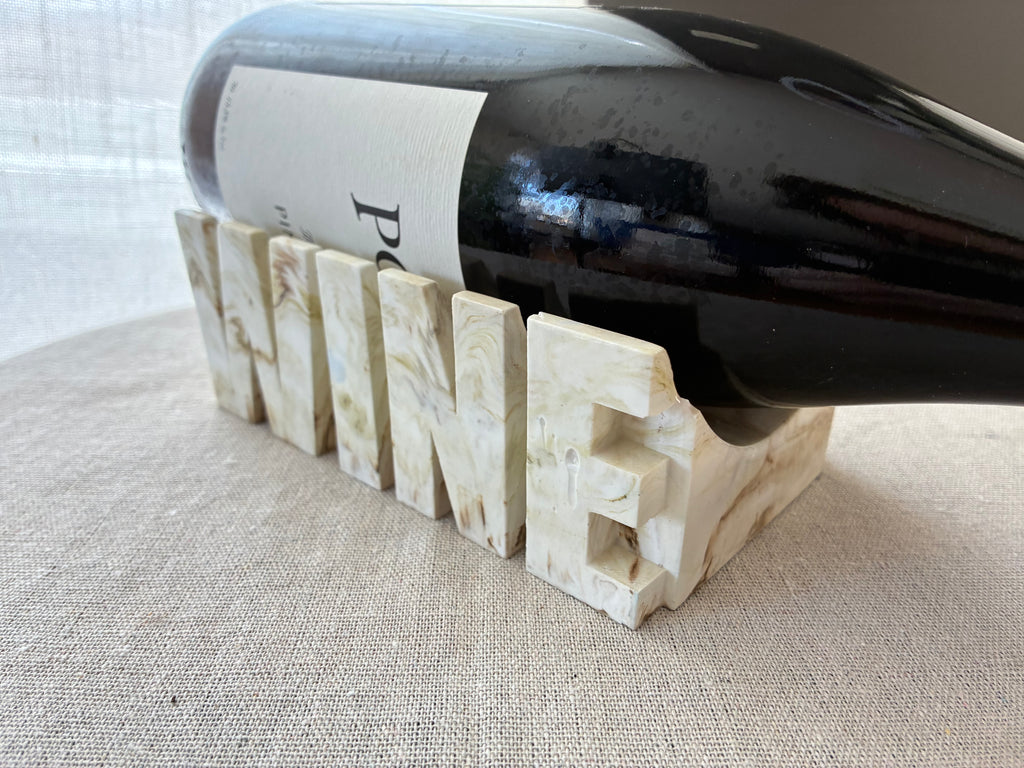 Ivory Strata – Sculpted Wine Cradle